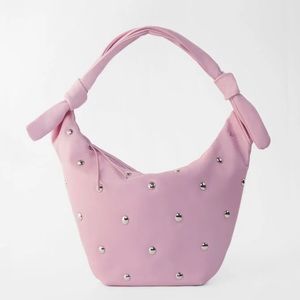 Maje leather belt bag with studs